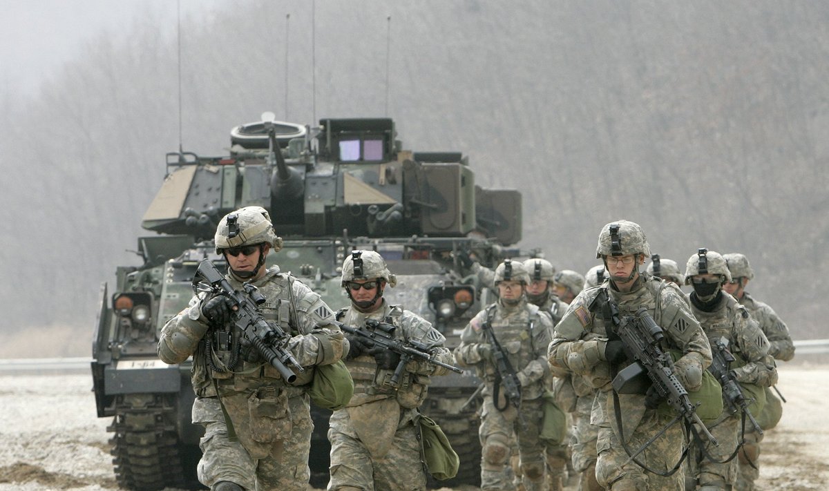 Soldiers of U.S. Army battalion Task Force Hawkins march during a live fire drill at the U.S. army's Rodriguez range in Pocheon