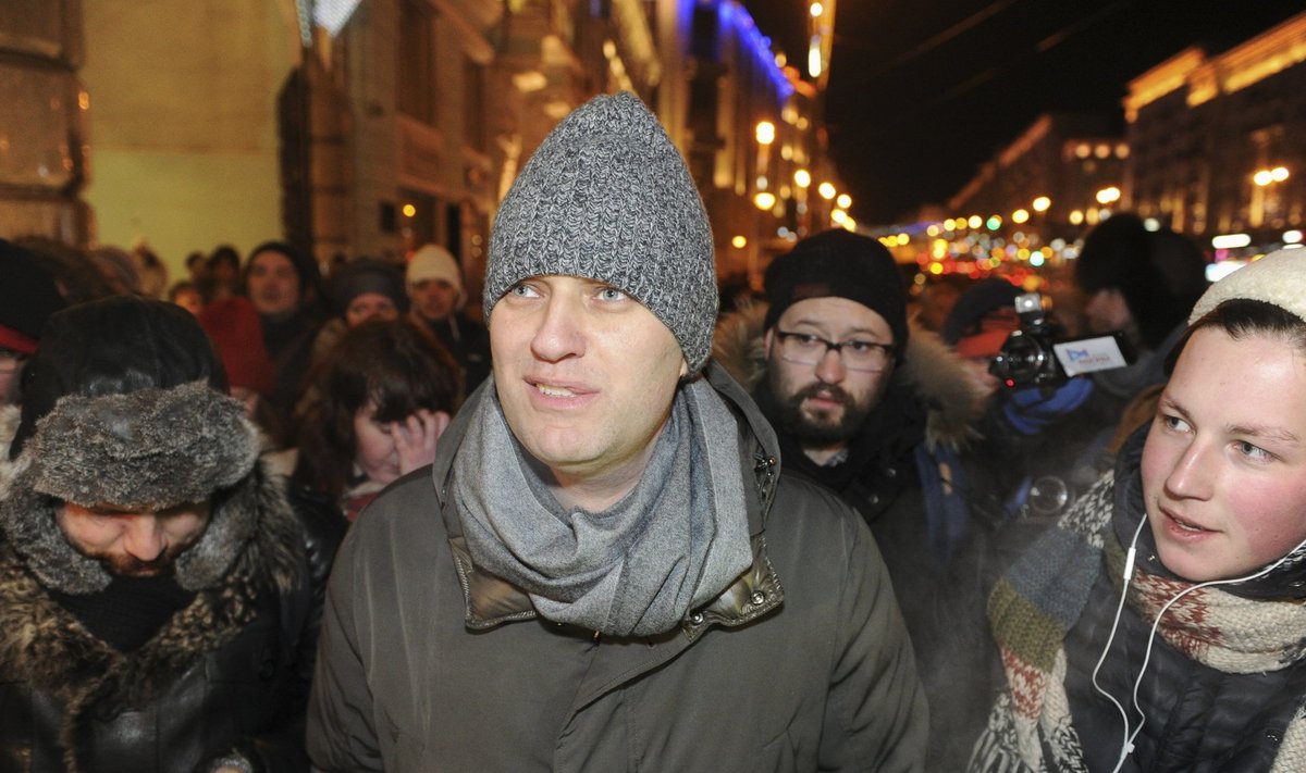 Alexei Navalny, Russian opposition leader and anti-corruption blogger, walks to attend an opposition rally in Moscow