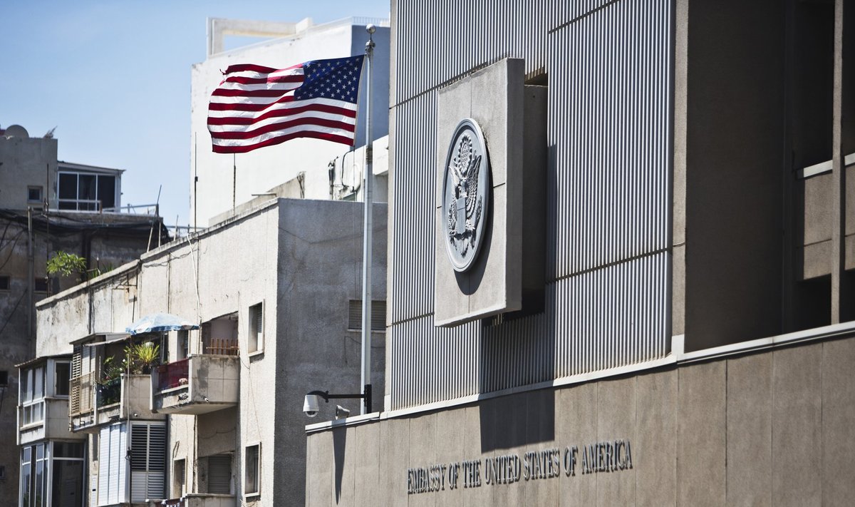 A flag flutters outside the U.S. embassy in Tel Aviv