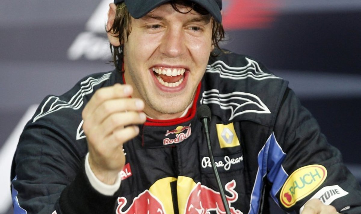 Red Bull Formula One driver Sebastian Vettel of Germany gestures during the news conference following the Malaysian F1 Grand Prix at Sepang circuit, outside Kuala Lumpur April 4, 2010.  REUTERS/Zainal Abd Halim (MALAYSIA)
