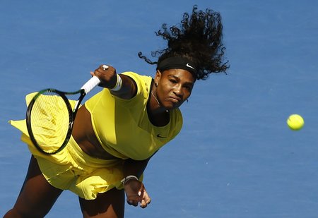 Williams of the U.S. serves during her quarter-final match against Russia's Sharapova at the Australian Open tennis tournament at Melbourne Park