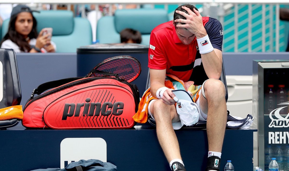 John Isner 31. märtsil võitles Miami Openi finaalis Roger Federeri vastu vigastusega.