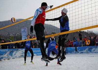 Nikolas Berger of Austria and Giba Godoy of Brazil are seen in action during an event promoting the Snow Volleyball hosted by FIVB and CEV in Pyeongchang