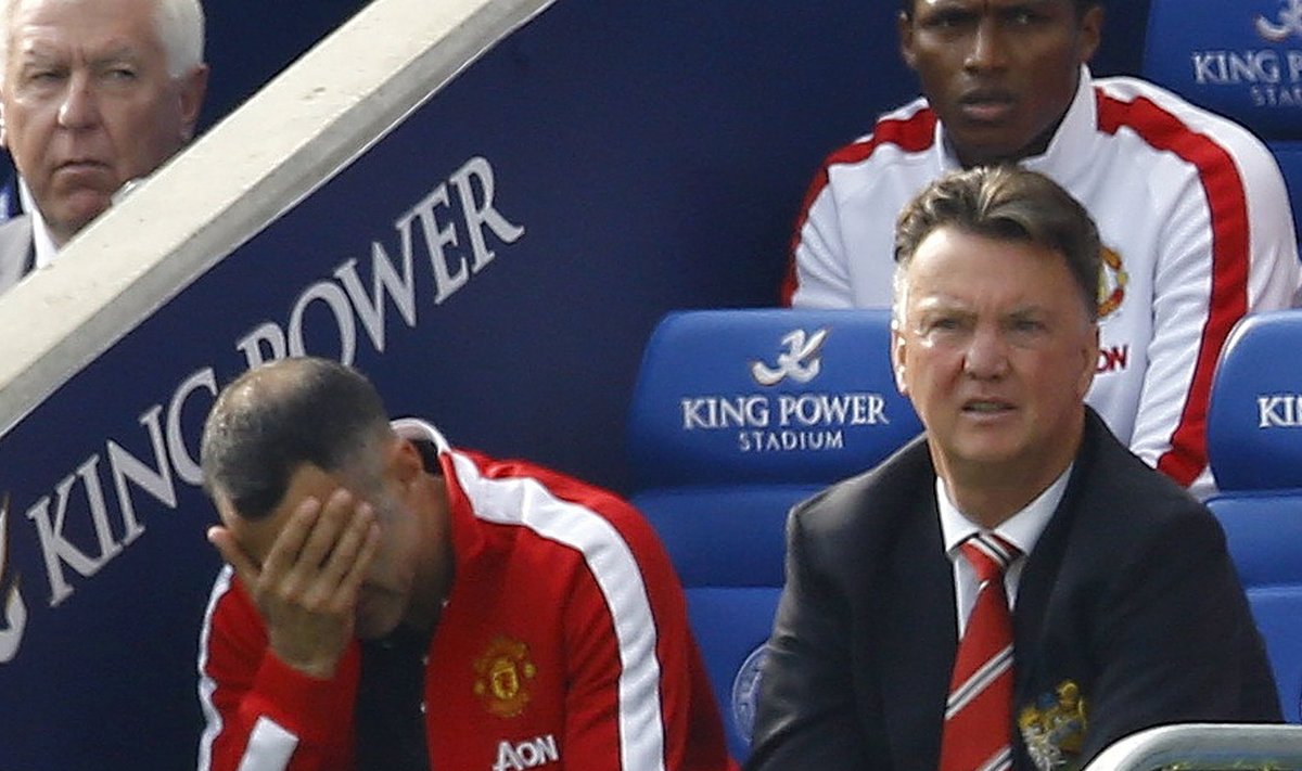 Manchester United manager Van Gaal and his assistant Giggs react during their English Premier League soccer match against Leicester City at the King Power stadium in Leicester