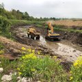 ФОТО: В Ида-Вирумаа начались работы по очистке самого загрязненного участка реки Пуртсе