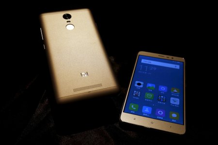 Redmi Note 3 smartphones by Xiaomi are seen during a launching ceremony in Hong Kong