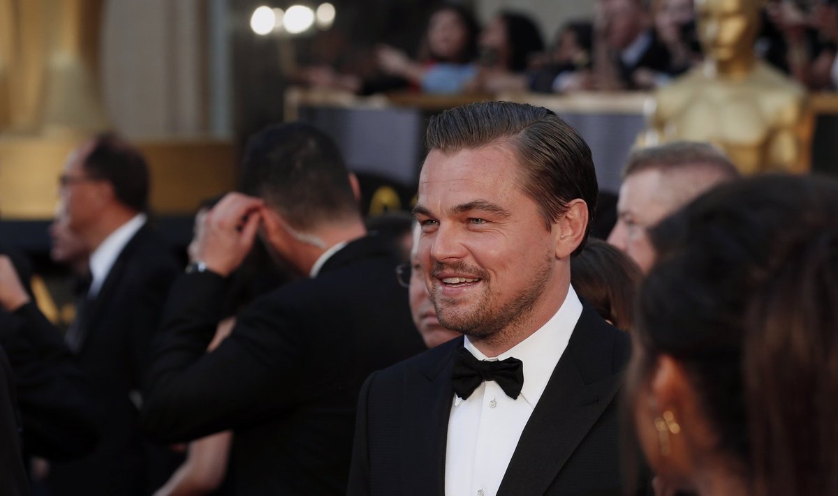 Leonardo DiCaprio, nominated for Best Actor for his role in "The Revenant", wearing a Giorgio Armani tuxedo, arrives at the 88th Academy Awards in Hollywood, California