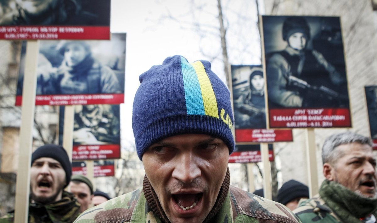 Activists of the Right Sector political party attend an anti-government march in Kiev
