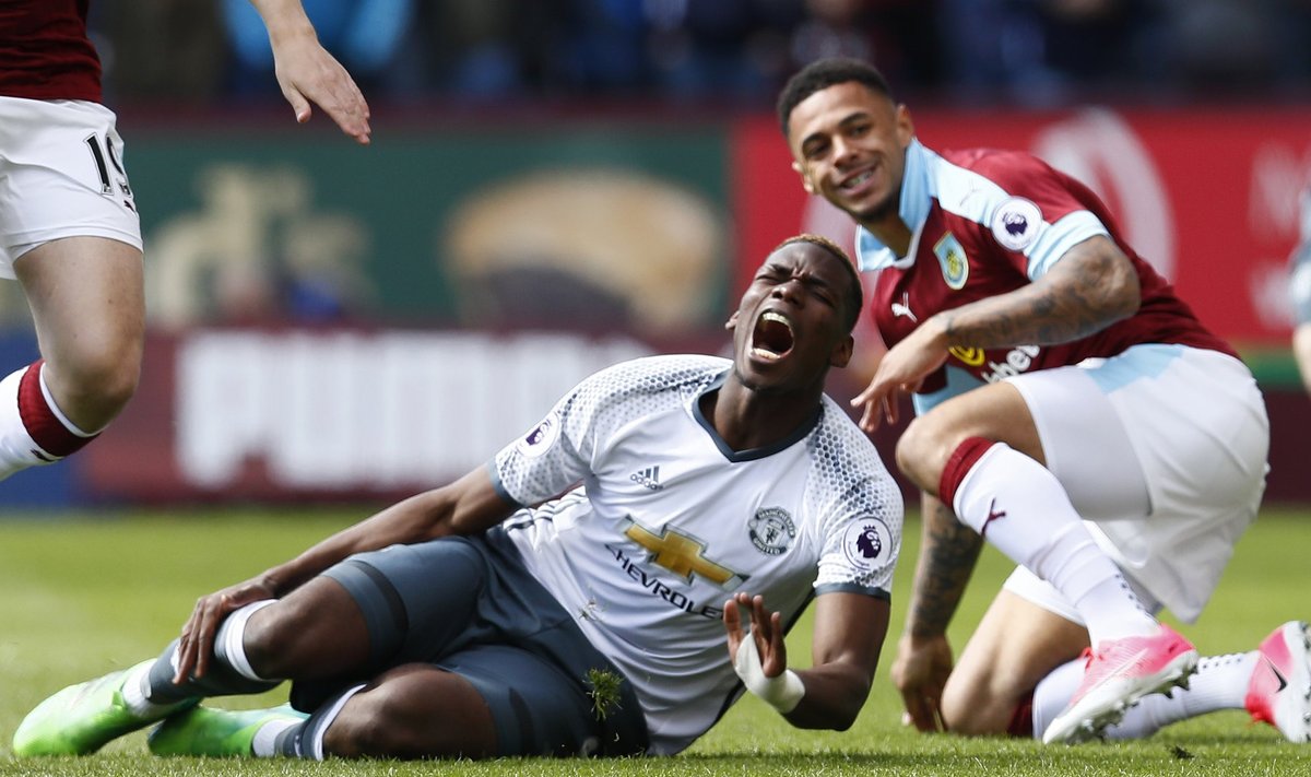 Manchester United's Paul Pogba is fouled by Burnley's Andre Gray