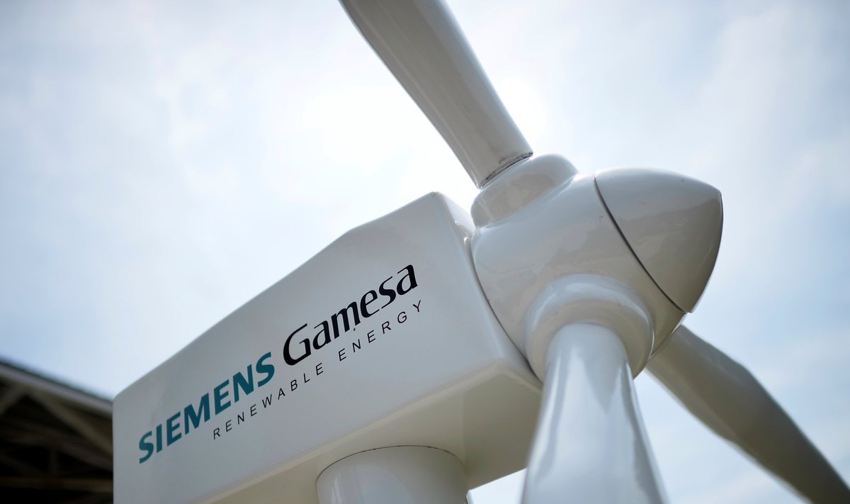 A model of a wind turbine with the Siemens Gamesa logo is displayed outside the annual general shareholders meeting in Zamudio