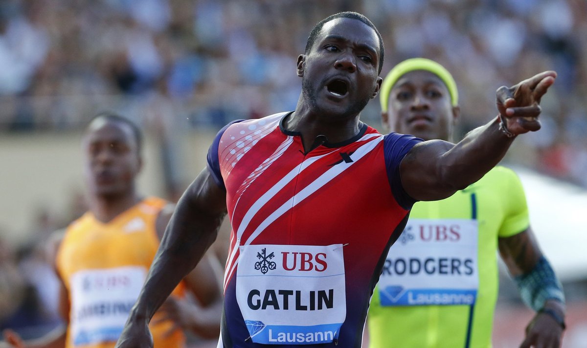 Justin Gatlin of the U.S. reacts as he crosses the finish line in the men's 100m race during the Lausanne Diamond League meeting at the Stade de la Pontaise in Lausanne