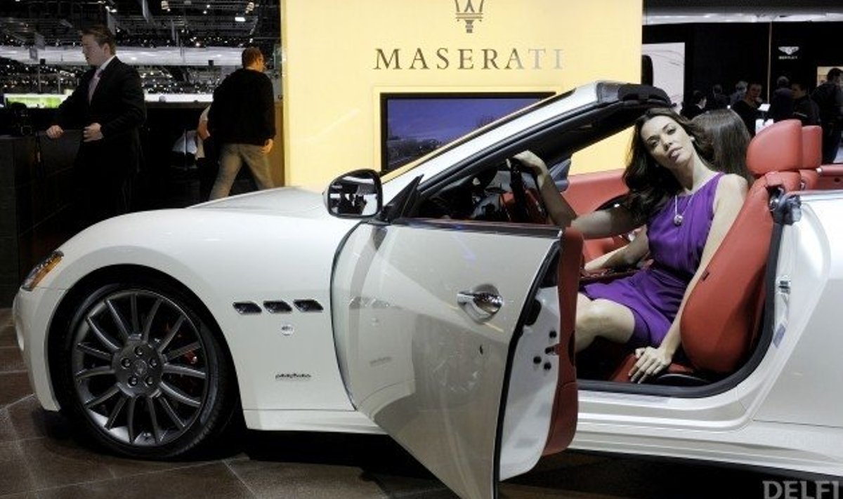 A model poses sitting in the new Maserati GranCabrio on March 3, 2010  during the third press day at the 80th Geneva International Motor Show at Palexpo in Geneva.AFP PHOTO/PHILIPPE DESMAZES