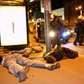 ФОТО: Полицейские на улицах, ночной бунт и разбитые витрины