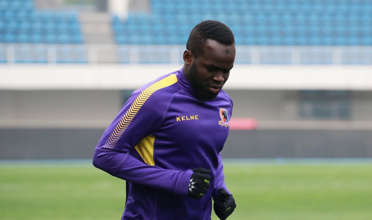 Former Ivory Coast international soccer player Cheick Tiote takes part in a training session of soccer club Beijing Enterprises in Beijing