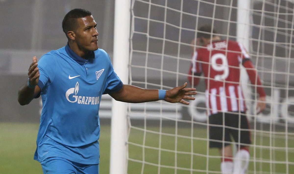 Zenit St. Petersburg's Rondon celebrates after scoring a goal during the Europa League round of 32 second leg soccer match against PSV Eindhoven at the Petrovsky stadium in St. Petersburg