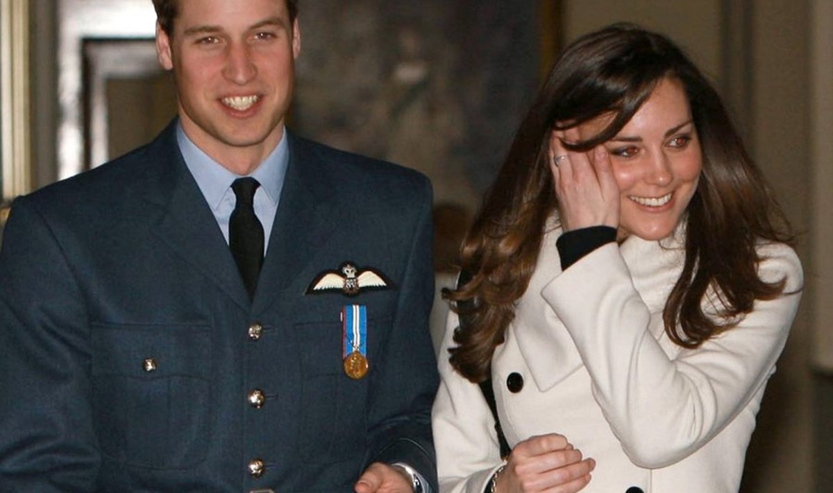 Britain's Prince William (L) smiles as he walks with his girlfriend Kate Middleton at RAF Cranwell, central England April 11, 2008.  William received his Royal Air Force wings from Prince Charles on Friday. William, the fourth successive generation of the monarchy to become an RAF pilot, learned to fly on his four-month attachment.  REUTERS/Michael Dunlea/Pool (BRITAIN)