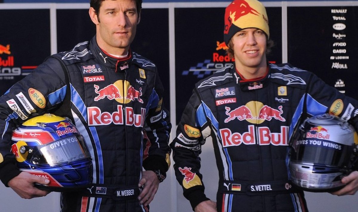 Red Bull Formula One drivers Sebastian Vettel of Germany, right, and Mark Webber of Australia, left, pose during the official presentation of the Red Bull Formula One Team 2010 at the Jerez racetrack in southern Spain Wednesday Feb. 10, 2010. ( AP Photo/Miguel Angel Morenatti ) / SCANPIX Code: 436