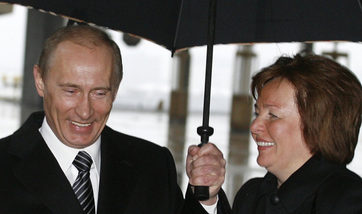 File photo of Russia's President Putin and his wife walking in Moscow
