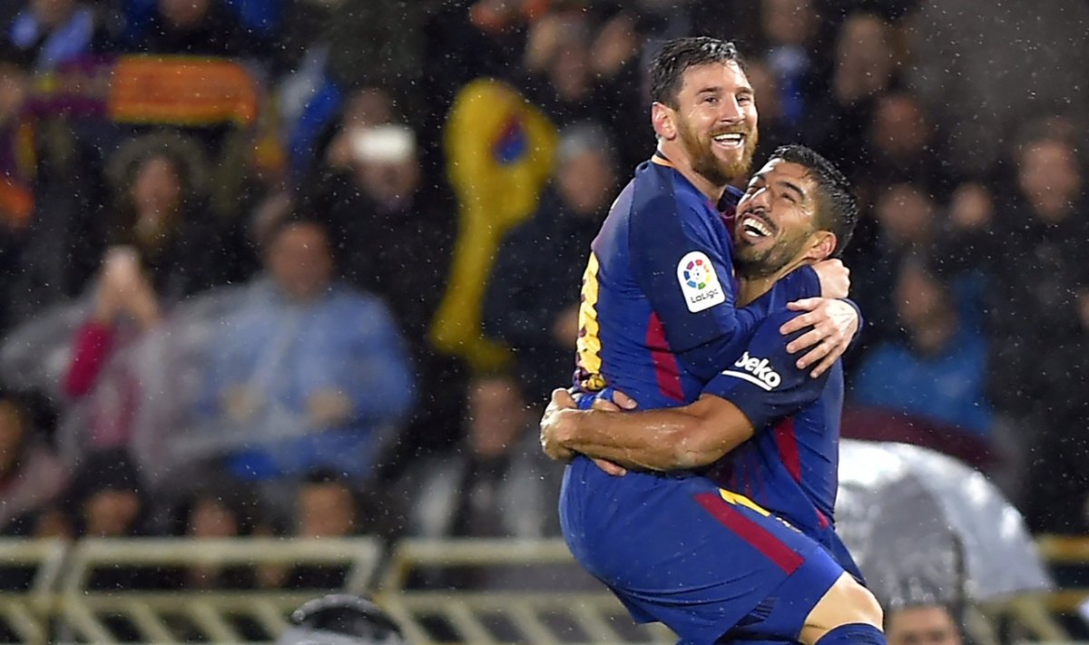 Lionel Messi ja Luis Suarez väravat tähistamas.