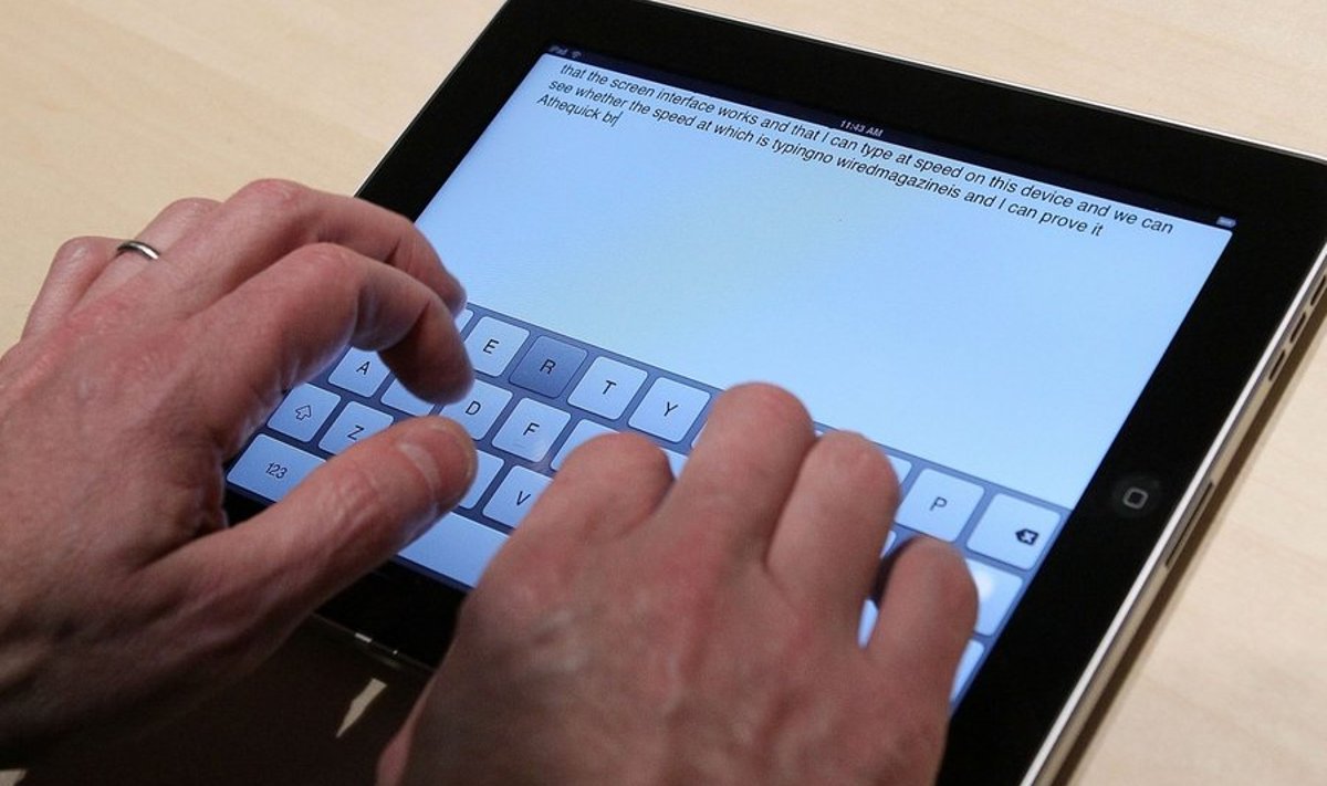 SAN FRANCISCO - JANUARY 27: An event guest plays with the new keyboard on a Apple iPad during an Apple Special Event at Yerba Buena Center for the Arts January 27, 2010 in San Francisco, California. CEO Steve Jobs and Apple Inc. introduced its latest creation, the iPad, a mobile tablet browsing device that is a cross between the iPhone and a MacBook laptop.   Justin Sullivan/Getty Images/AFP