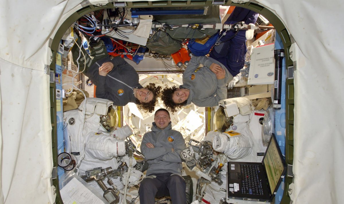 This photo provided by NASA shows astronauts Andrew Morgan with Christina Koch and Jessica Meir at the International Space Station on Friday, Oct. 18, 2019.