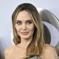 РЕДКИЙ КАДР | Анджелина Джоли появилась на публике с сыном Паксом