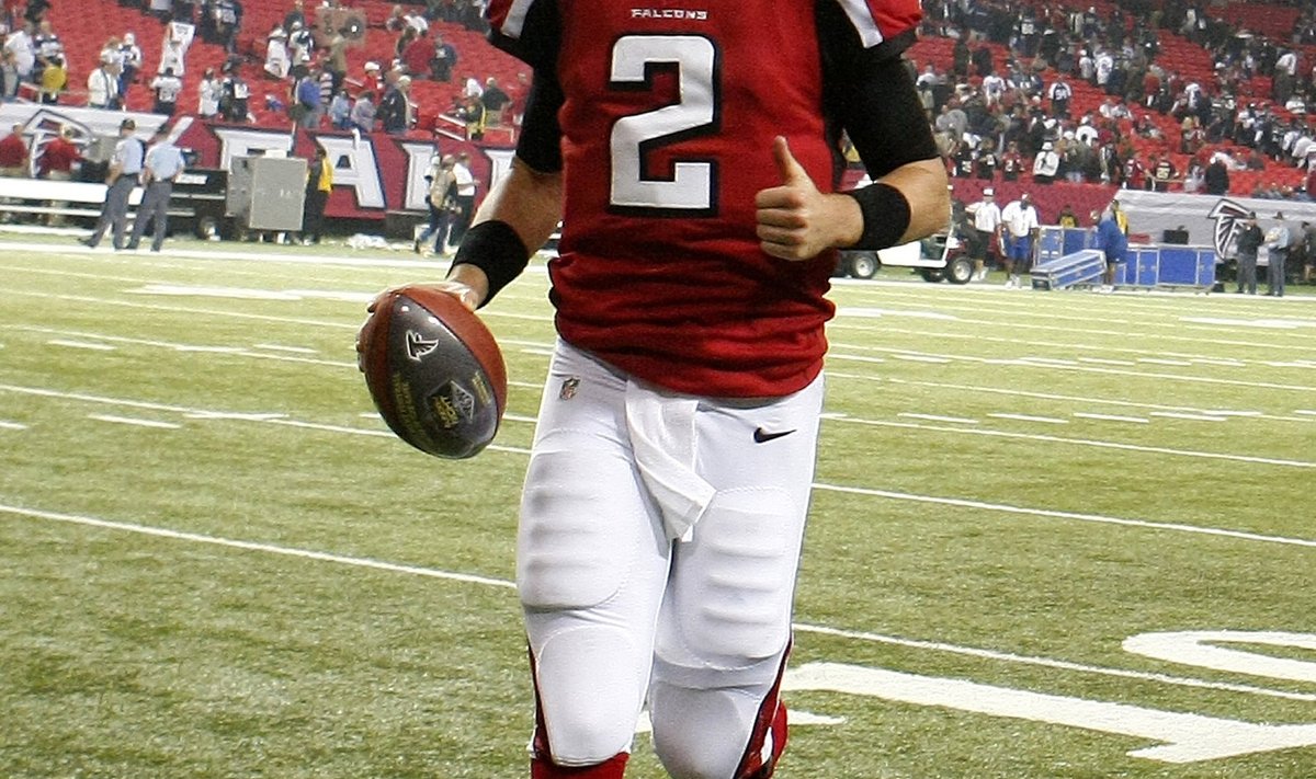 Falcons quarterback Ryan runs off the field after the team defeated Cowboys during their NFL football game in Atlanta