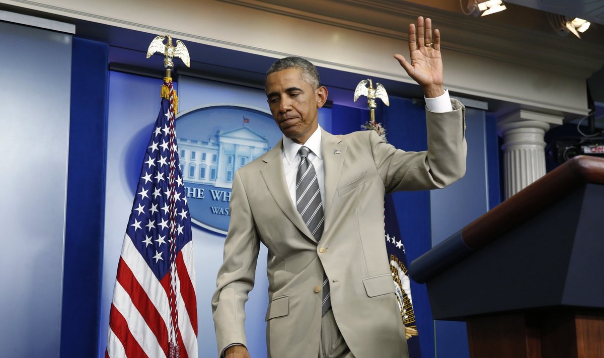 U.S. President Obama departs the White House Press Briefing Room after addressing reporters in Washington