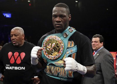 FILE PHOTO - Wilder celebrates after knocking out Artur Szpilka in the ninth round of their heavyweight title boxing fight at Barclays Center, in Brooklyn