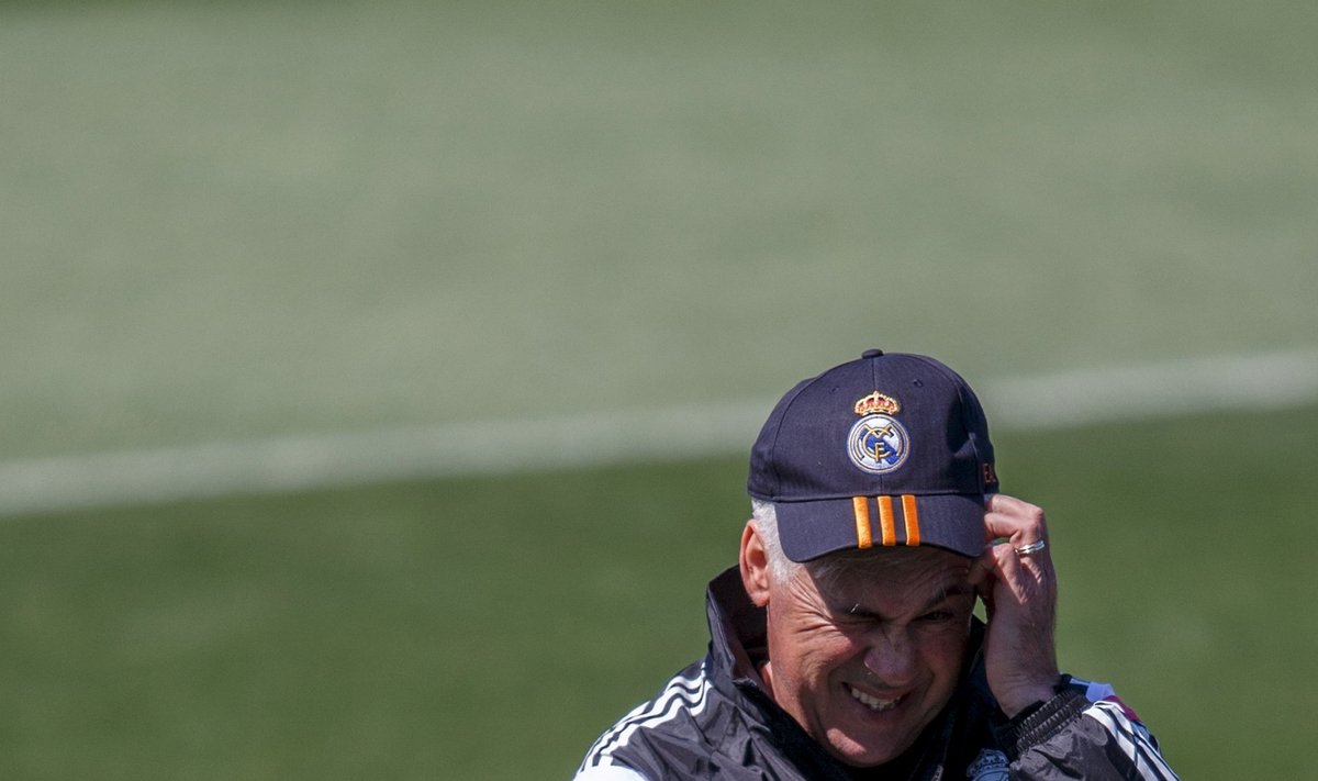 Real Madrid coach Carlo Ancelotti reacts during a training session at Valdebebas, outside Madrid, Spain