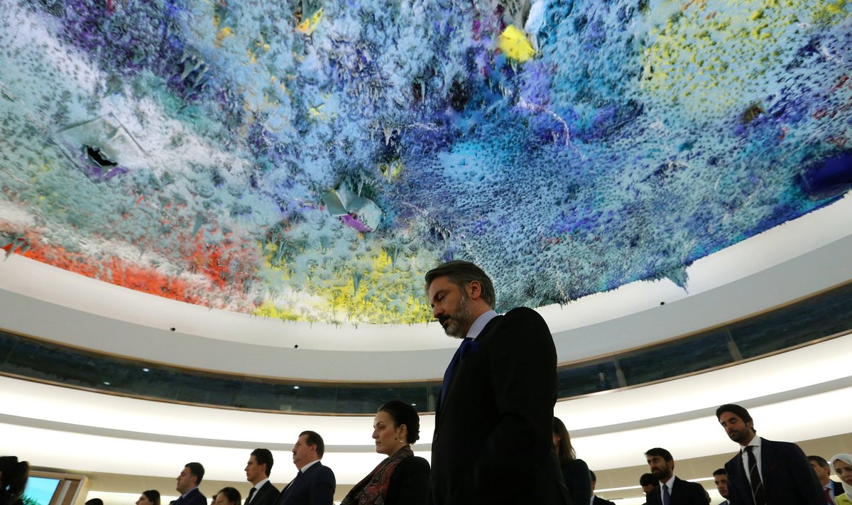 Attendees observe a minute of silence at the start of a special session of the Human Rights Council on Aleppo in Geneva