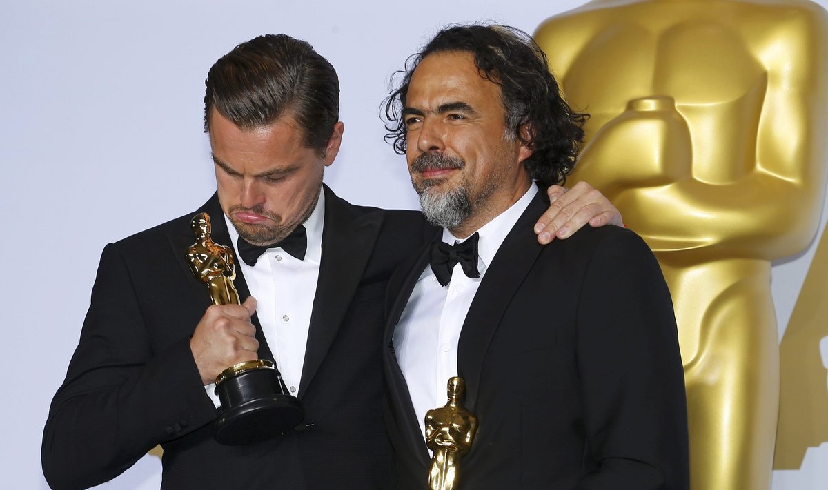 Leonardo DiCaprio, Best Actor winner for his role in "The Revenant", and Best Director winner Alejandro G. Inarritu for "The Revenant" pose with their Oscars together backstage at the 88th Academy Awards in Hollywood