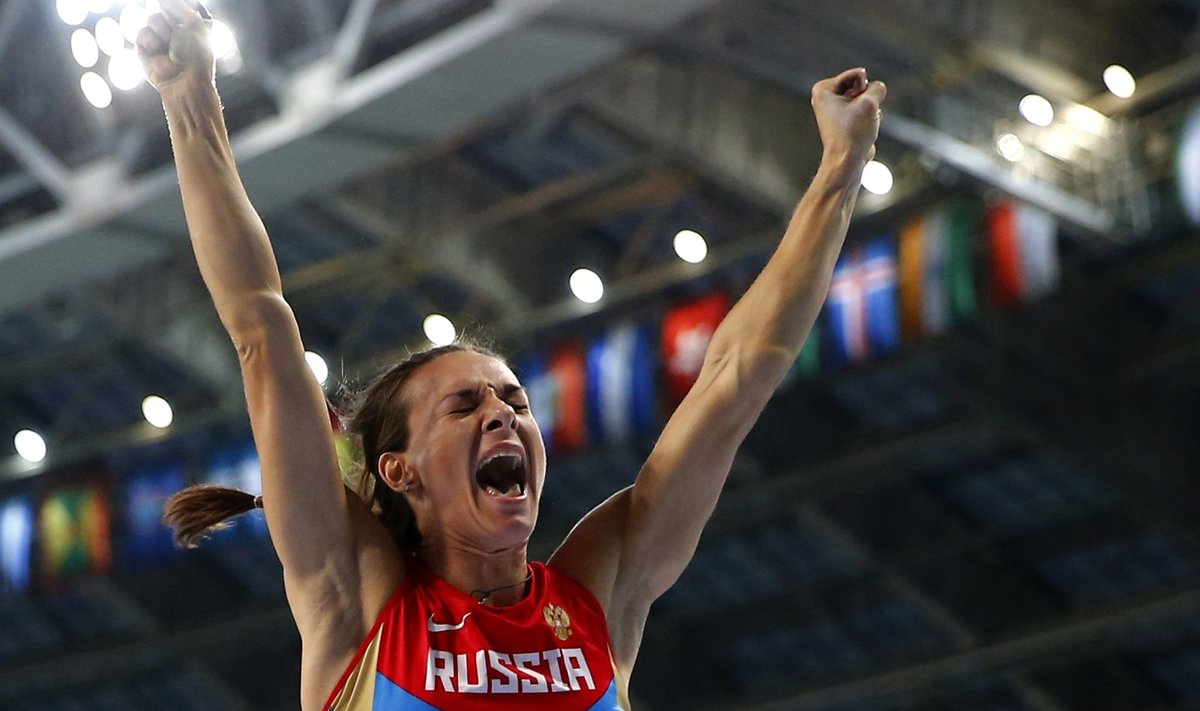 Isinbayeva of Russia reacts after winning women's pole vault final at World Athletics Championships in Moscow