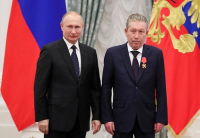 Ravil Maganov (paremal) ning Putin. 