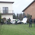 ФОТО | Во двор дома в пригороде Каунаса упал самолет: два человека погибли