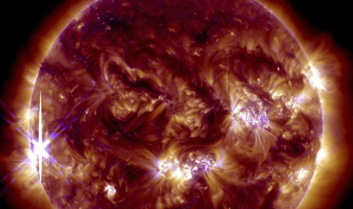 A solar flare is pictured erupting from the sun in this NASA handout photo from its Solar Dynamics Observatory