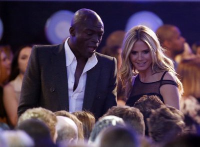 Singer Seal and model Heidi Klum speak to a member of the audience during a commercial break at the 2016 Billboard Awards in Las Vegas