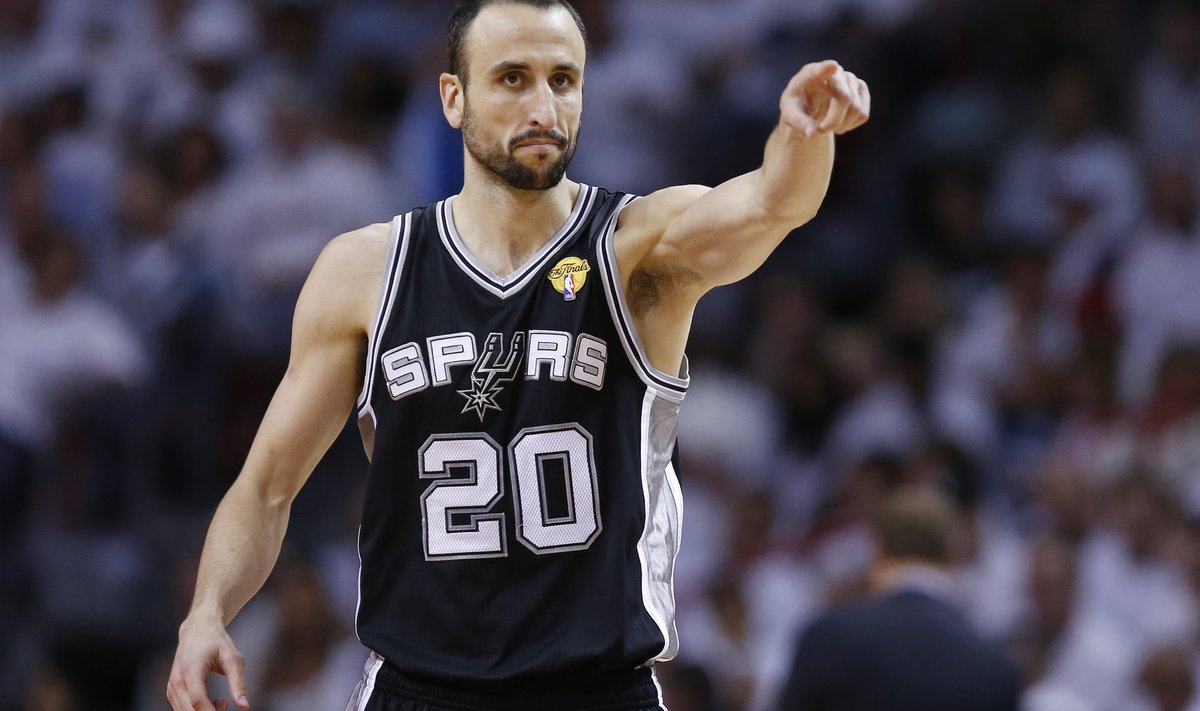 Spurs' Ginobili reacts after a basket against the Heat during Game 7 of their NBA Finals basketball playoff in Miami