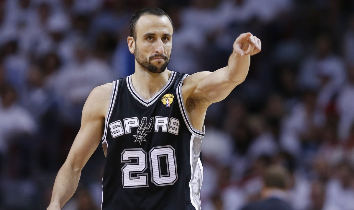 Spurs' Ginobili reacts after a basket against the Heat during Game 7 of their NBA Finals basketball playoff in Miami