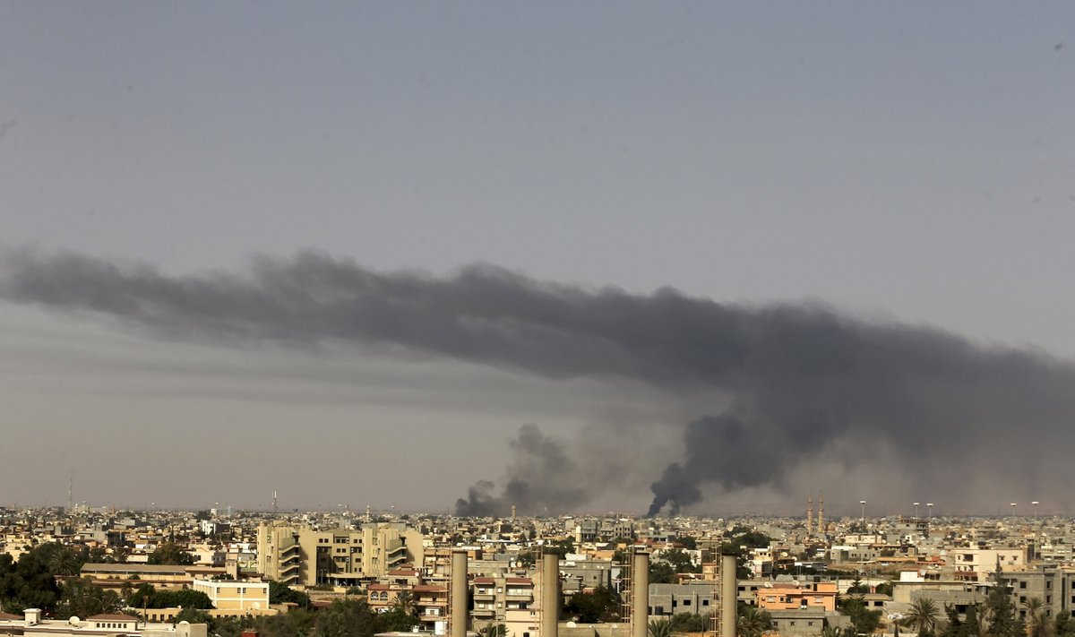 Black plumes of smoke is seen in the vicinity of Camp Thunderbolt, after clashes in Benghazi.