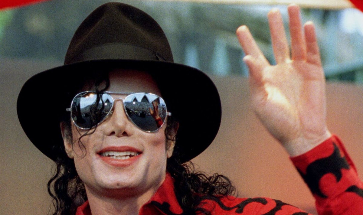 File photo of Michael Jackson waving to the crowd, numbering a few thousand, gathered in front of the Sydney Opera House