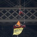 FOTOD JA VIDEO: Aktivist riputas ennast oranži telgiga Eiffeli tornist alla