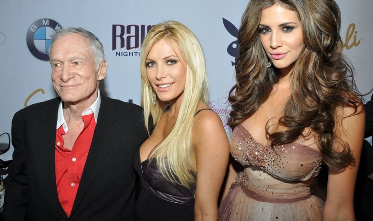 Hugh Hefner, Dasha Astafieva and Hope Dworaczyk, right, arrive at Playboy magazine's 2010 Playmate of the Year announcement and celebration at the Palms Casino Resort in Las Vegas on Saturday, May 15, 2010. (AP Photo/Joe Coomber) / SCANPIX Code: 436