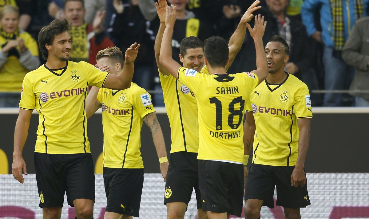 Borussia Dortmund's players celebrate a goal against Freiburg during the German first division Bundesliga soccer match in Dortmund