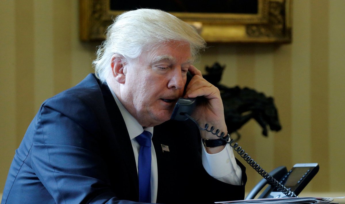 Trump speaks by phone with Merkel in the Oval Office at the White House in Washington