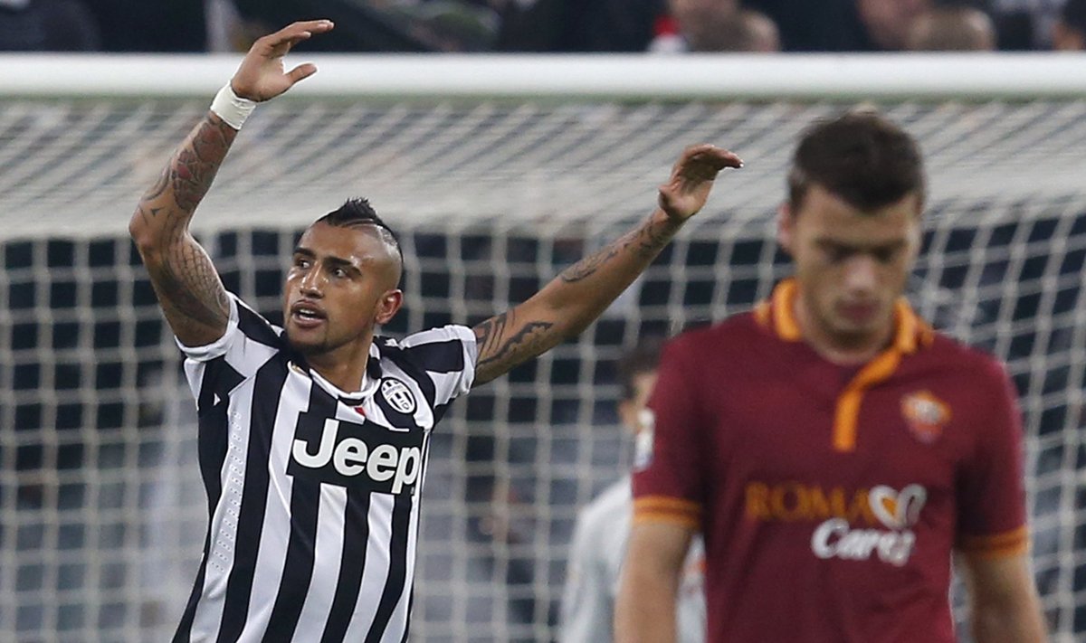 Juventus' Vidal celebrates after scoring against AS Roma during their Italian Serie A soccer match in Turin