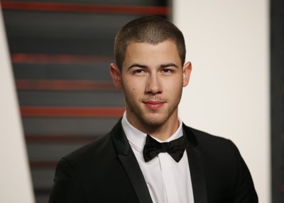 Nick Jonas arrives at the Vanity Fair Oscar Party in Beverly Hills