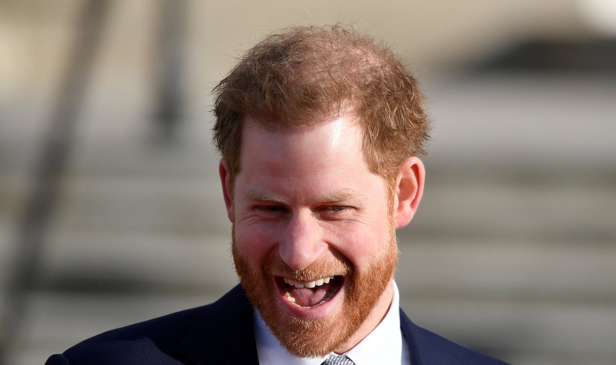 FILE PHOTO: Britain's Prince Harry attends a rugby event at Buckingham Palace gardens in London