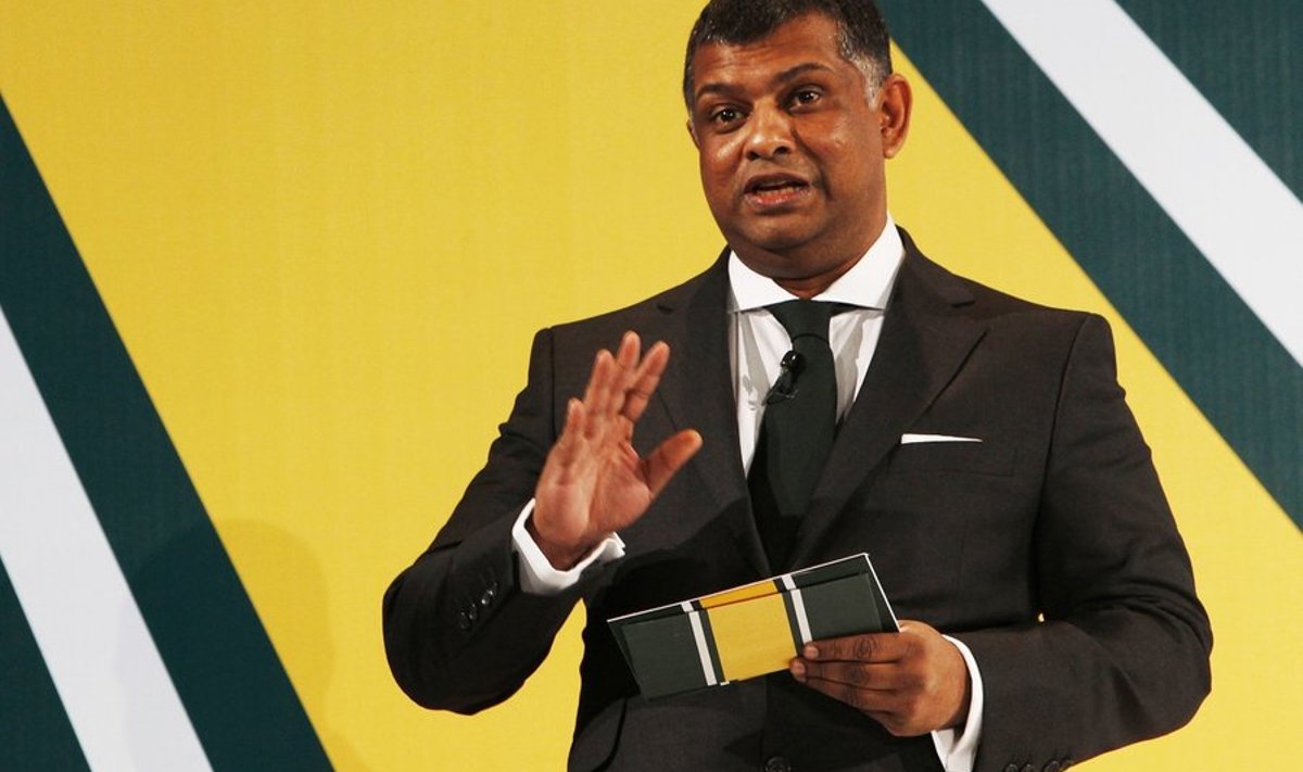 Formula One Team Principal Tony Fernandes speaks before the unveiling of the Lotus T127 at a launch in London February 12, 2010.    REUTERS/Luke MacGregor  (BRITAIN - Tags: SOCIETY SPORT MOTOR RACING)