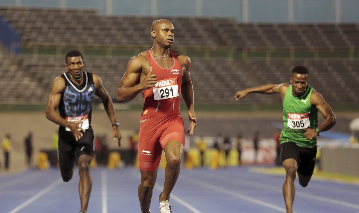 Jamaica's Powell competes in the men's 100m during the national trials at the National Stadium in Kingston